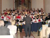 Zum Schluß singen alle drei Chöre gemeinsam,<br>unter Leitung von Jean Amiotte-Suchet<br>in französischer Sprache "Mon bon Jura"